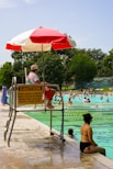 people swimming during daytime