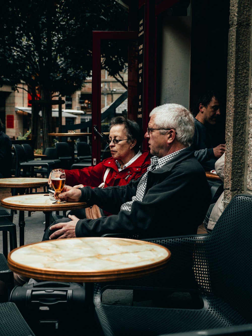 a couple of people sitting at a table