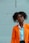 woman standing near white wall