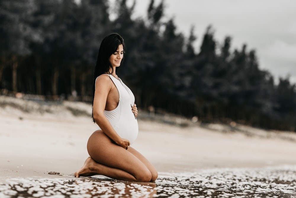 women wearing white swimsuit