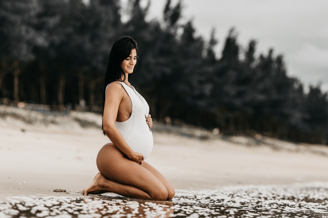 women wearing white swimsuit