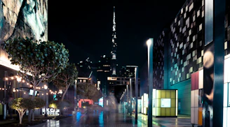 Wide-angle shot of an upscale commercial plaza highlighted by dynamic blue and white lighting.