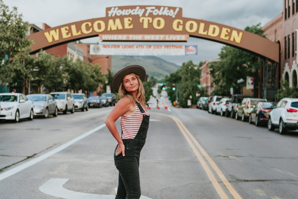 woman standing near parked vehicles