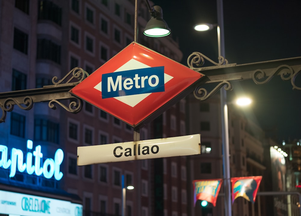 white, red, and blue Metro signage