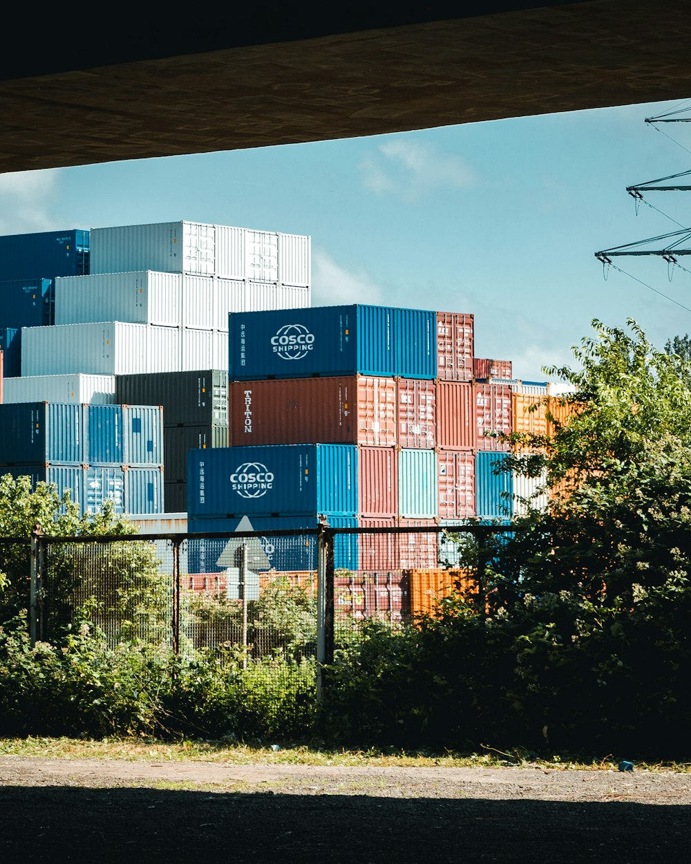 assorted-color cargo ship lot during daytime