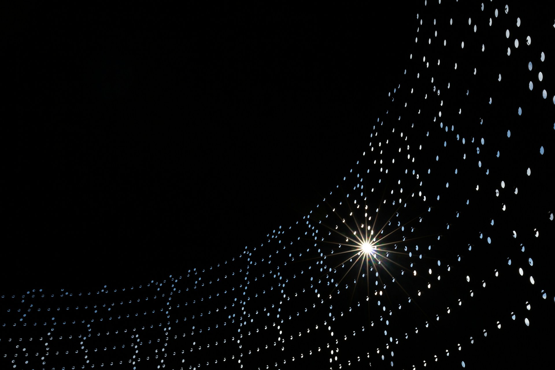 woman wearing yellow long-sleeved dress under white clouds and blue sky during daytime