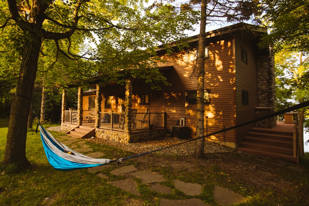 blue hammock hanging outside the house