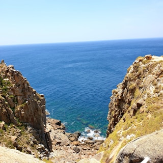 A beautiful coastal view of Brittany showcasing cliffs and the sea.