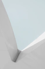 a man riding a skateboard down the side of a ramp