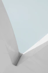 a man riding a skateboard down the side of a ramp