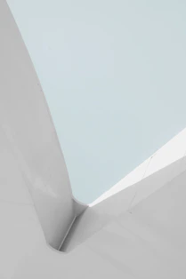 a man riding a skateboard down the side of a ramp