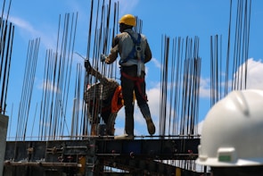 Close-up of safety harnesses securely fastened on a high-rise building project.