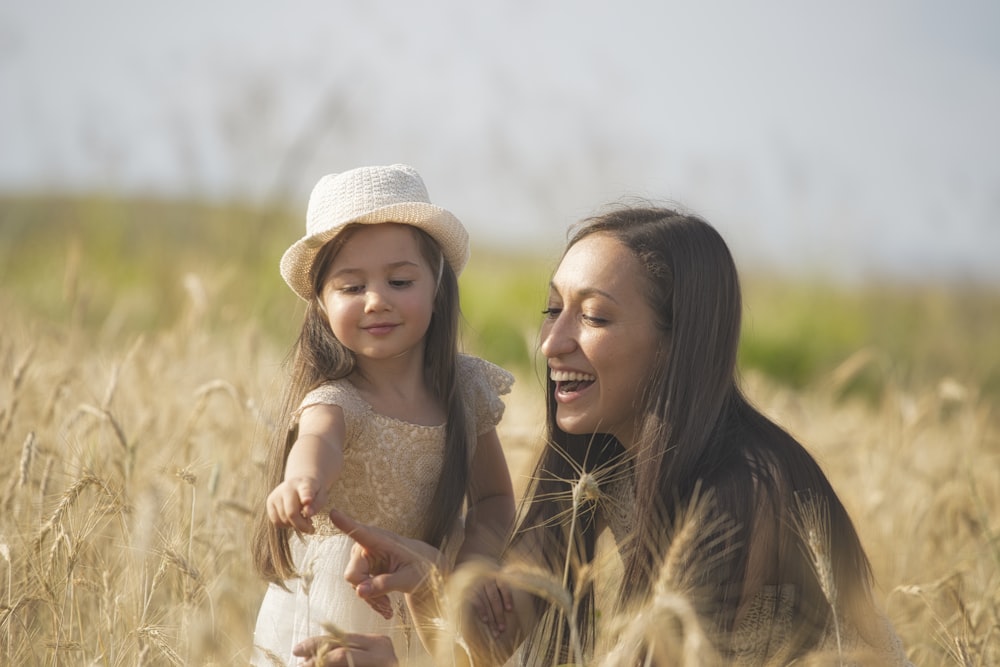 woman and girl on focus photography