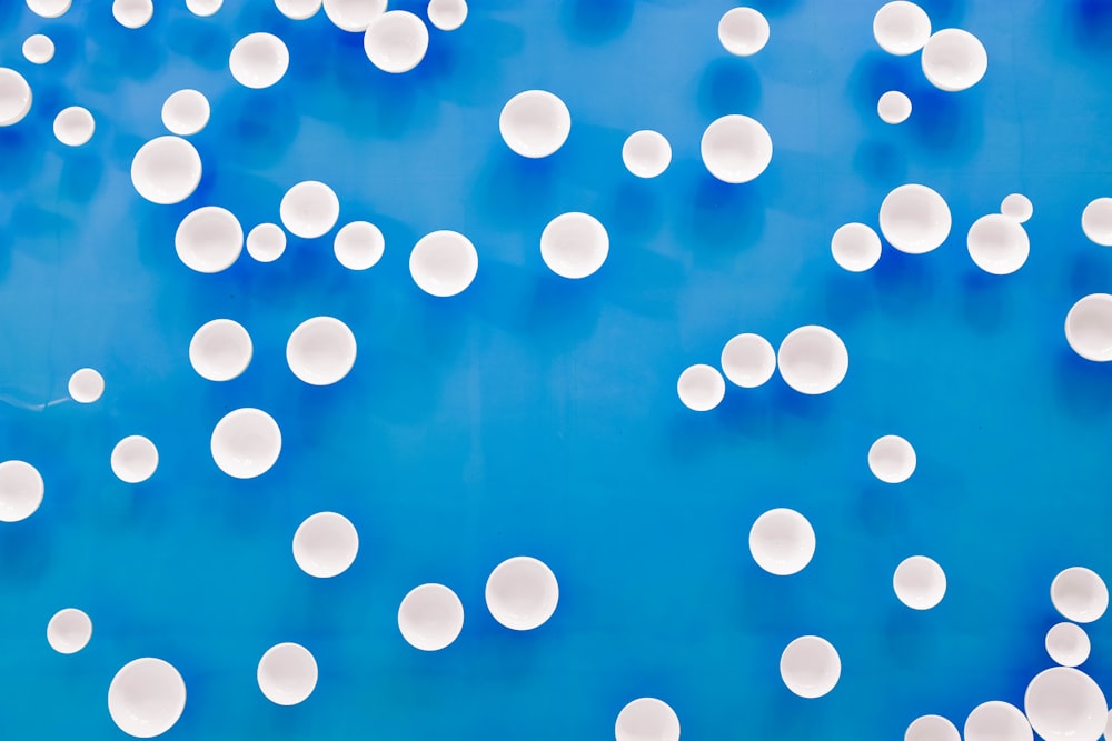 white and blue circles graphic art