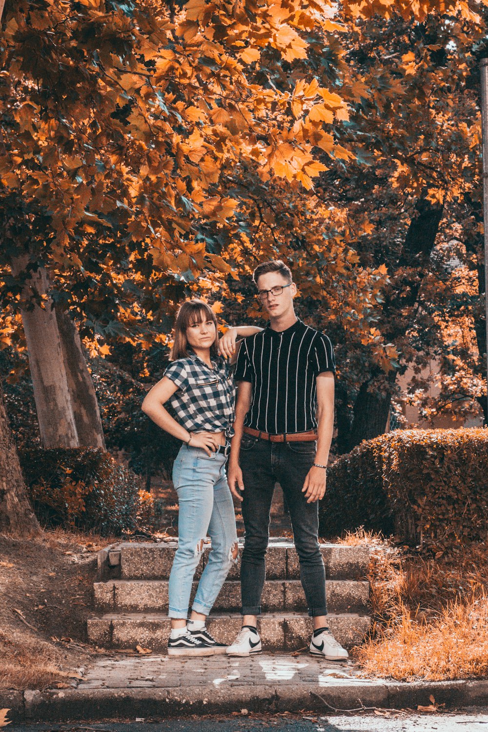 couple standing on concrete stair