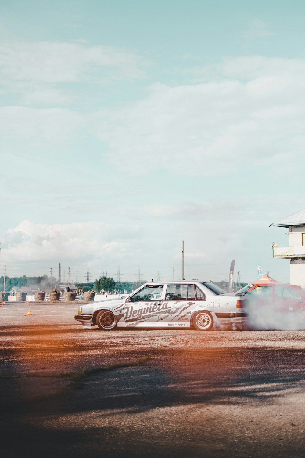 white and black sedan during daytime