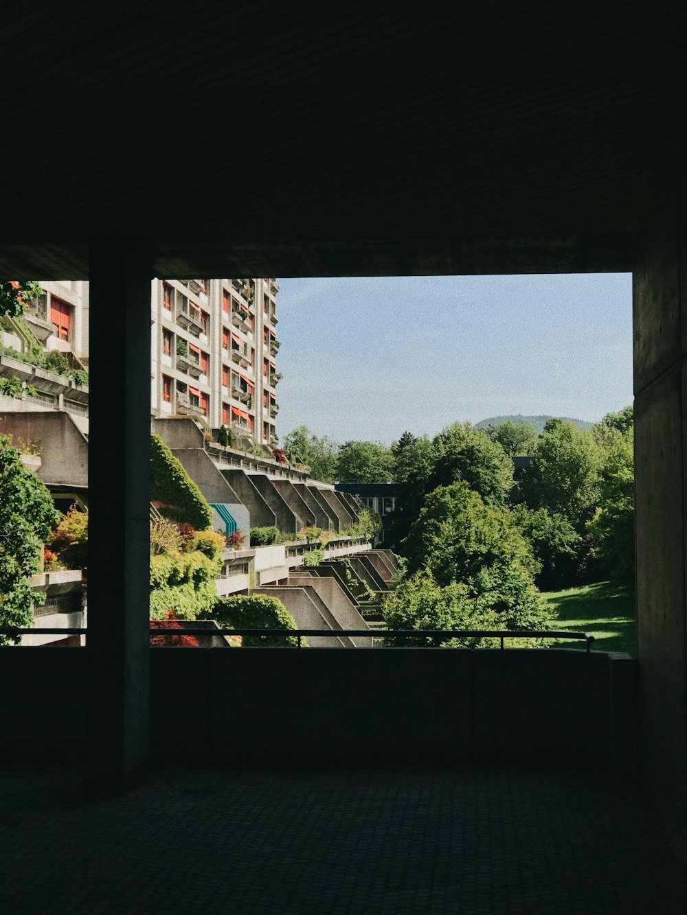 a view of a city from a window in a building