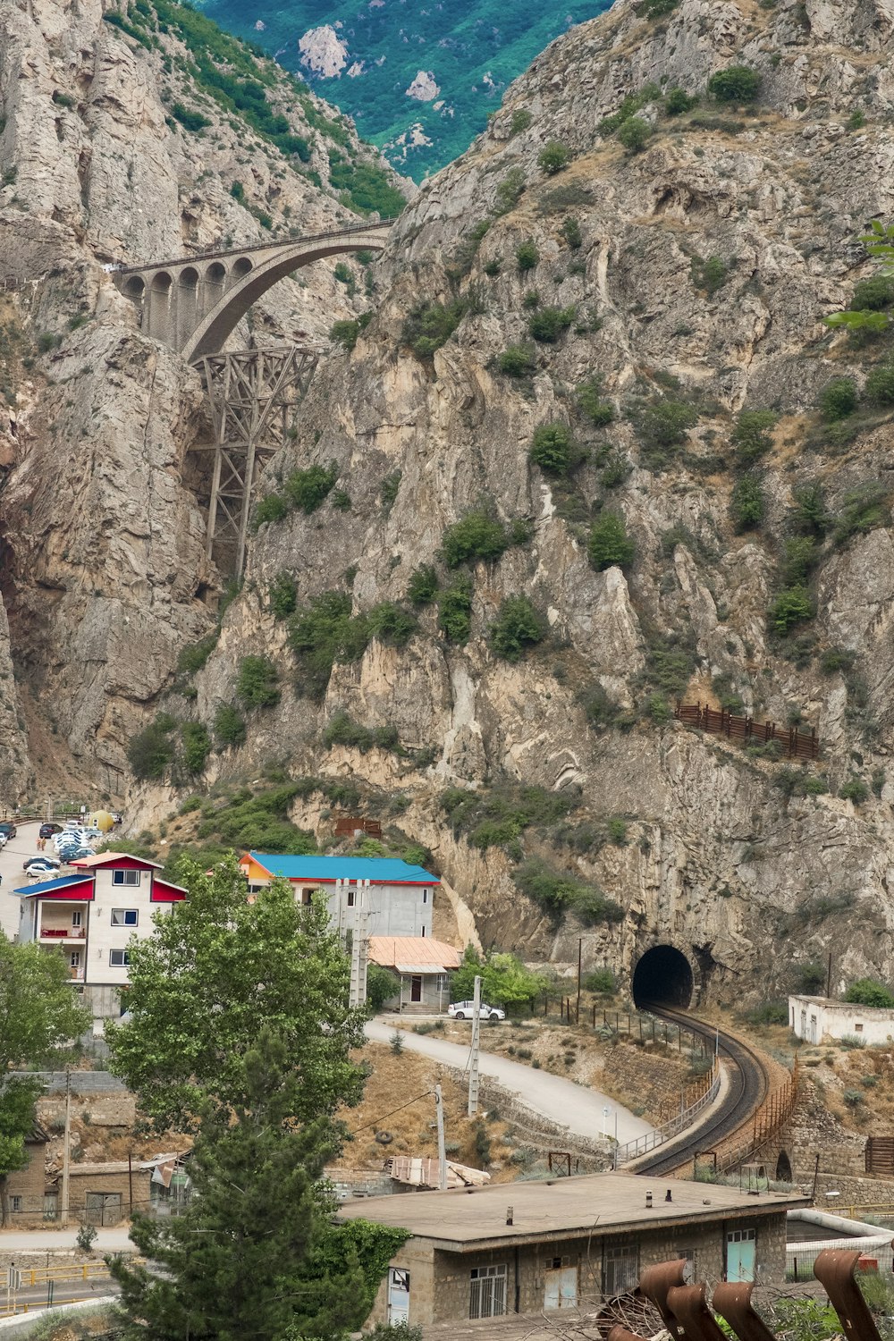 aerial photography of a bridge on a rocky mountain