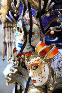 jester masquerade masks displayed along road