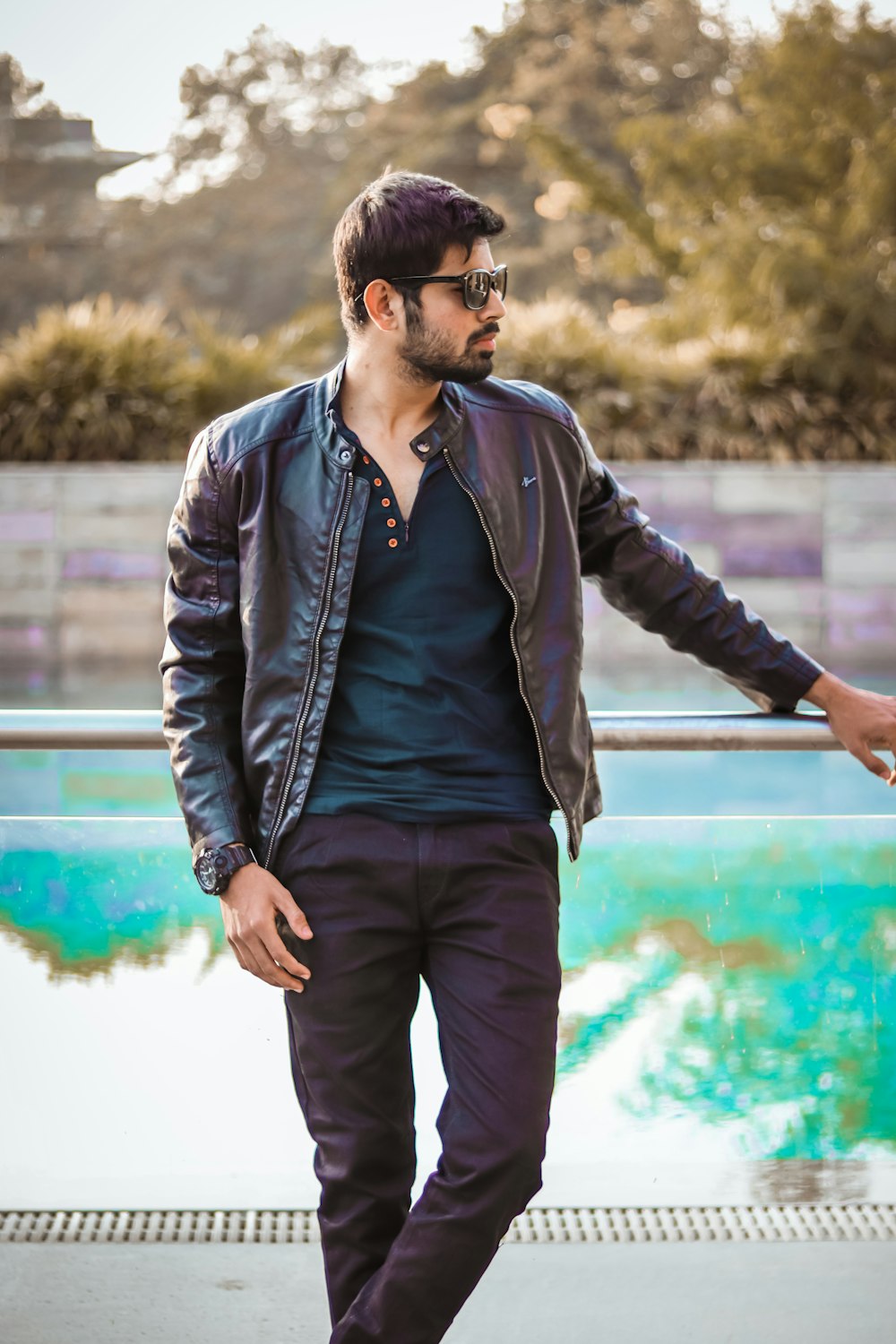 man wearing black leather jacket