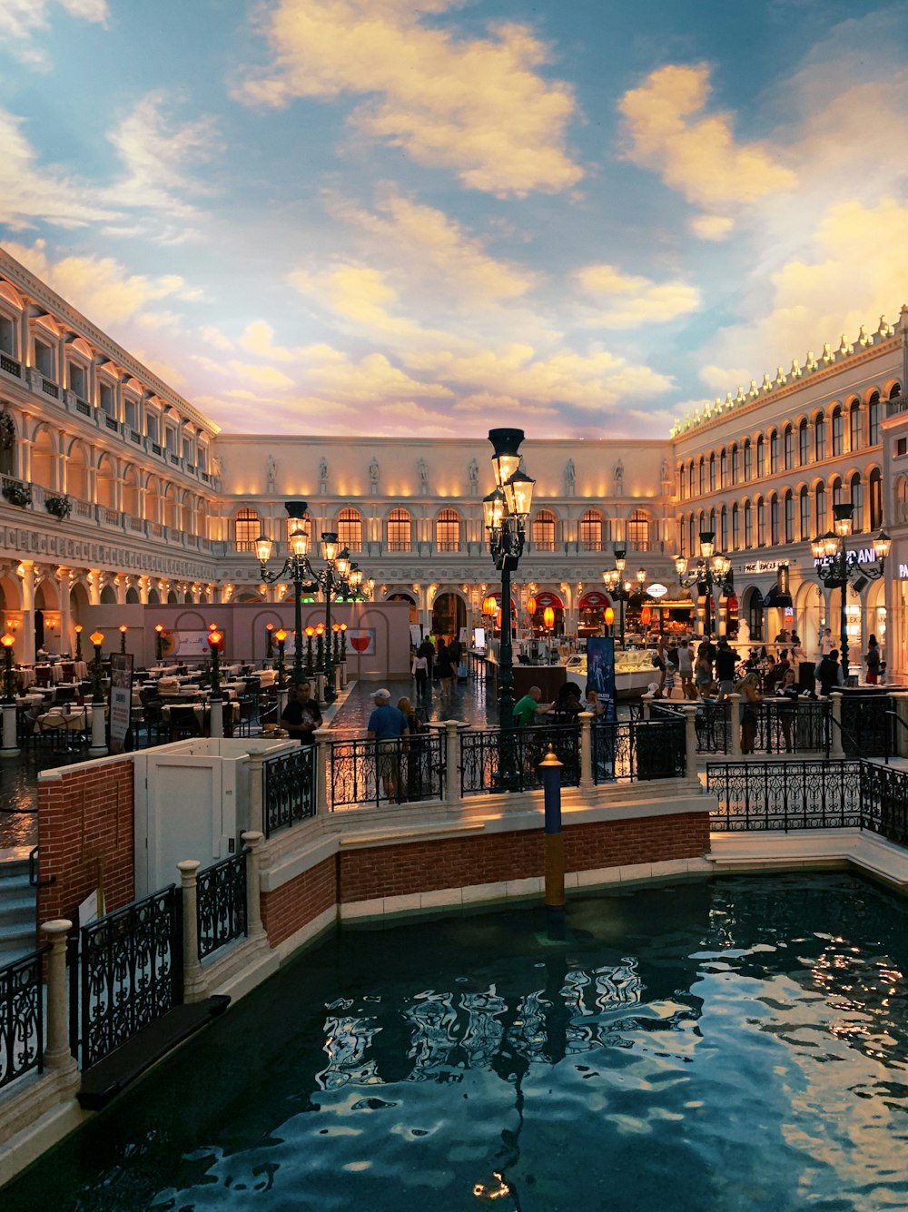 people near railings inside Venetian Macau