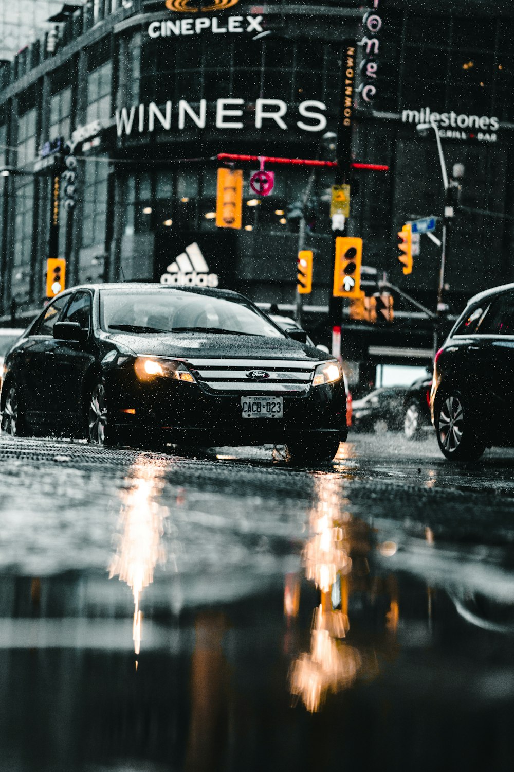 black sedan on the road