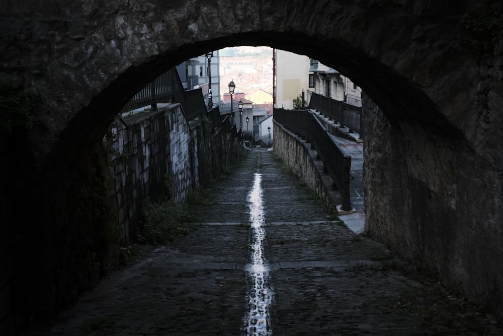 empty walkway under arch