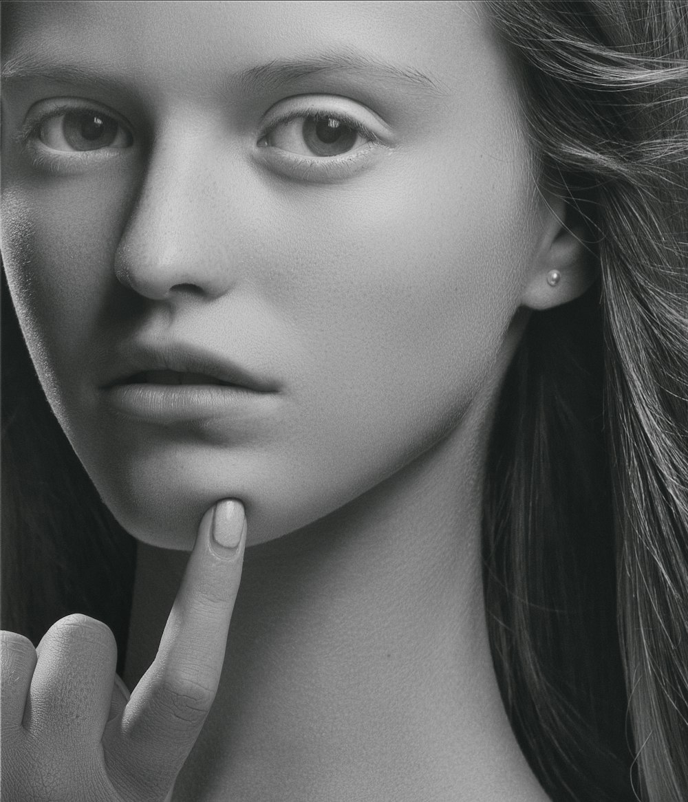 grayscale photography of woman's face