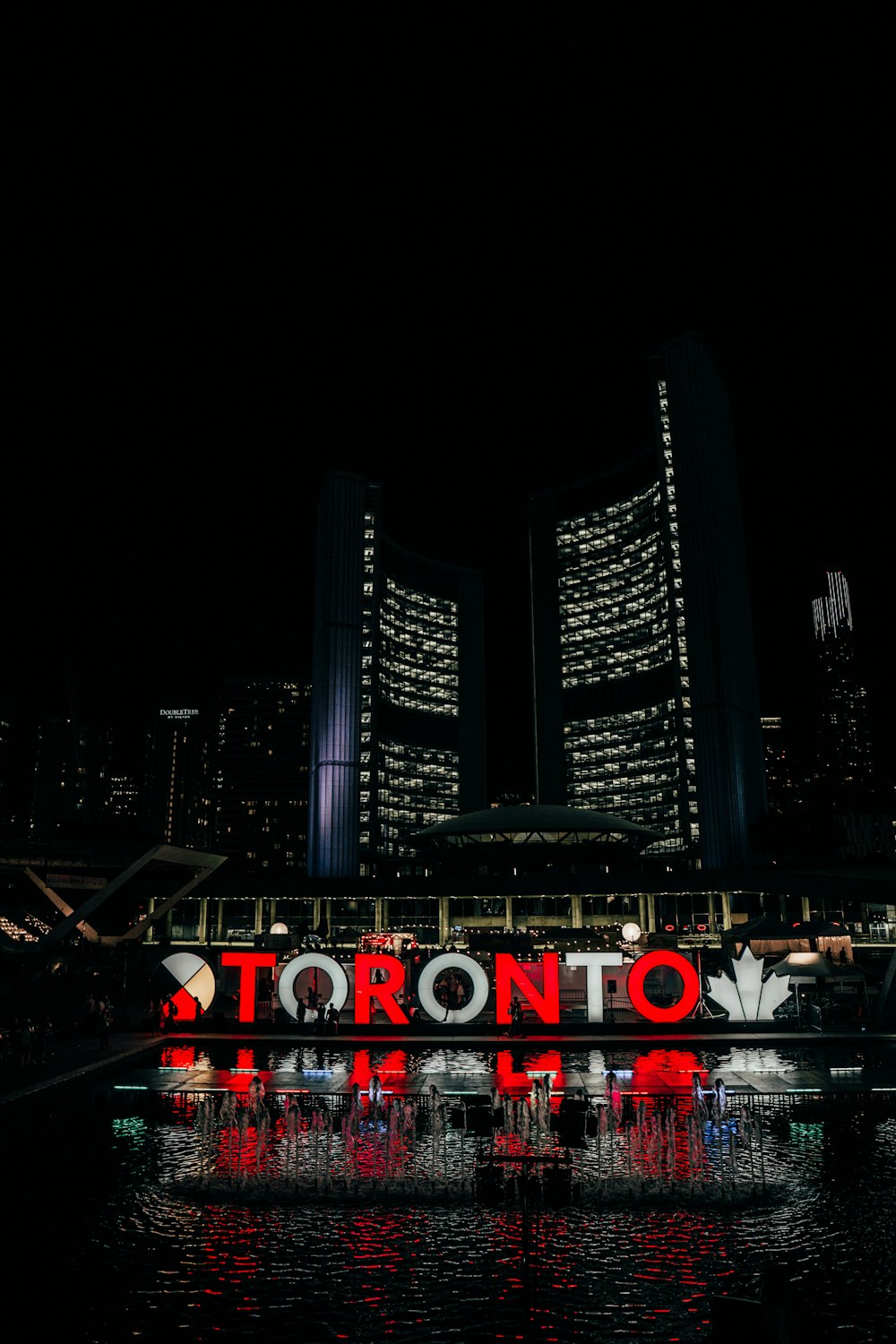 lighted Toronto sign at night