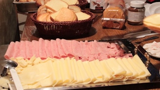 Close-up of assorted cold cuts arranged on a platter.