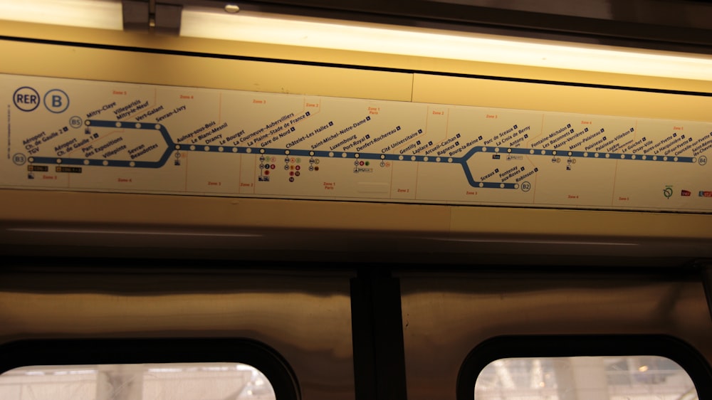 white and blue train tunnel map