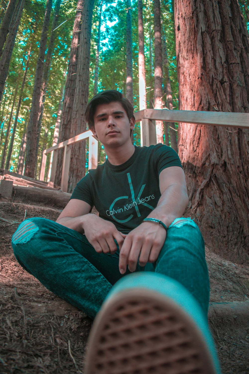 man siting near tree