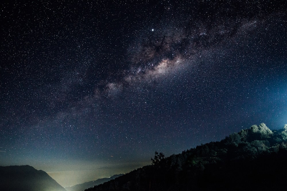 mountain under starry sky