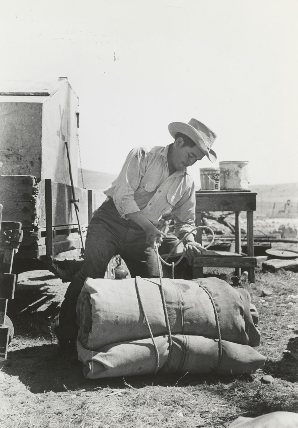 grayscale photo of man wearing cowboy hat