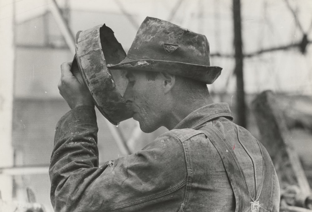 man drinking on bowl