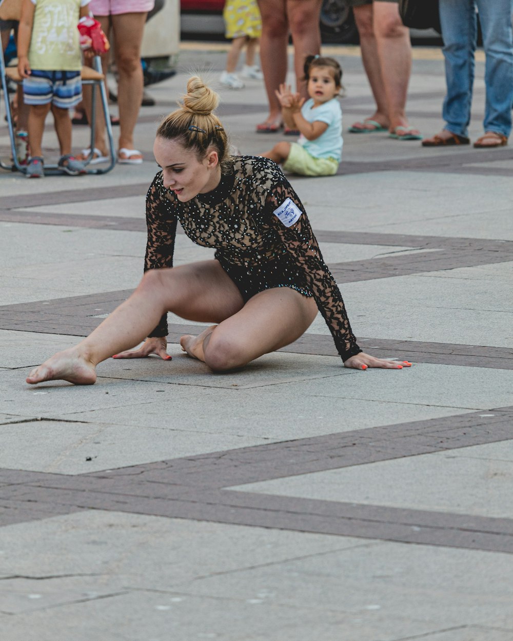woman sitting on ground