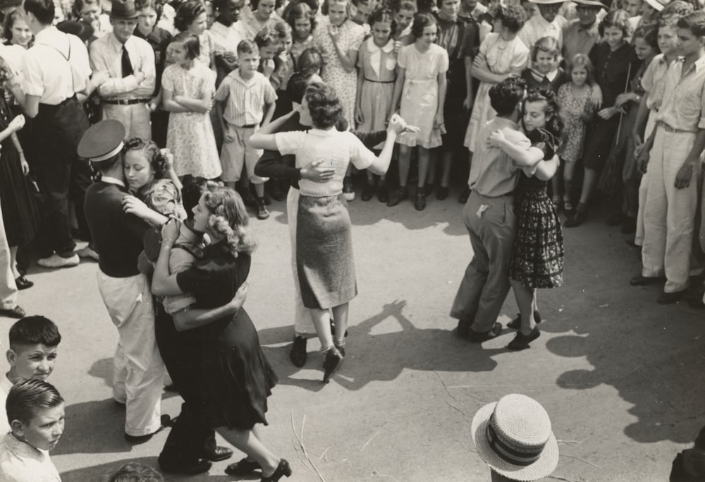 grayscale photo of people dancing
