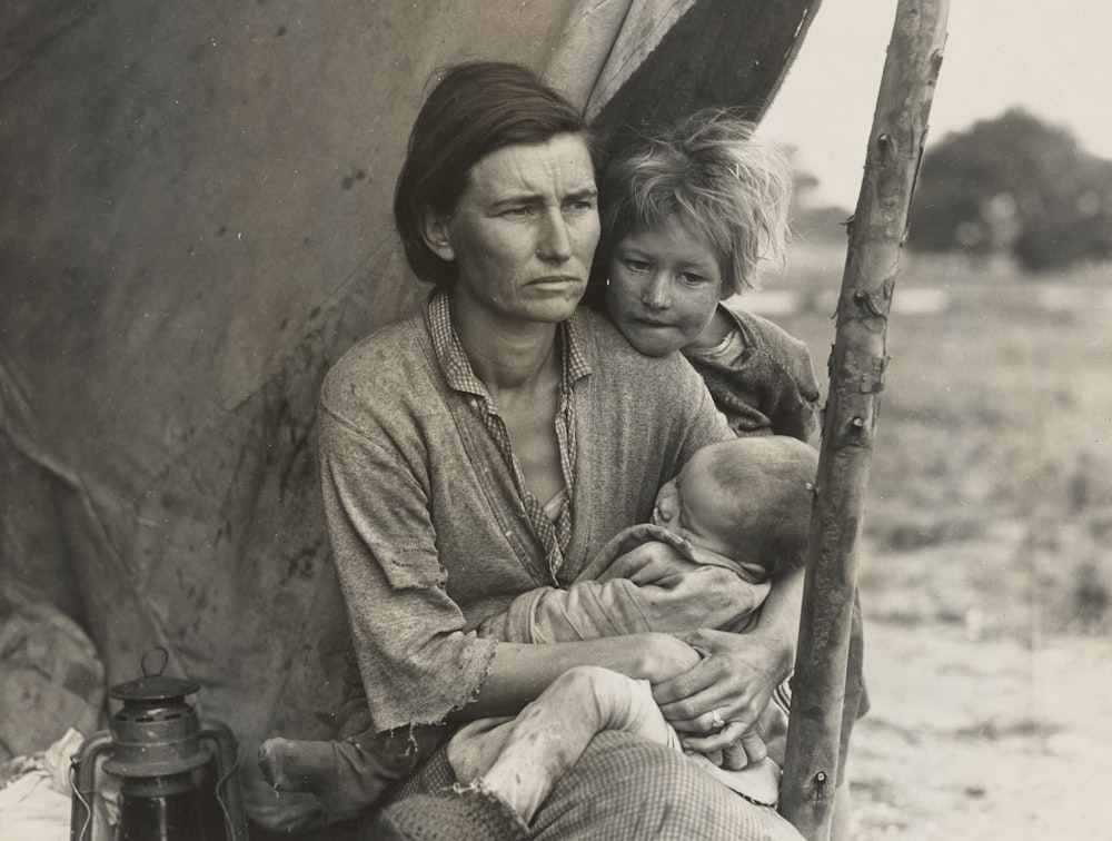 grayscale photo of mother and child