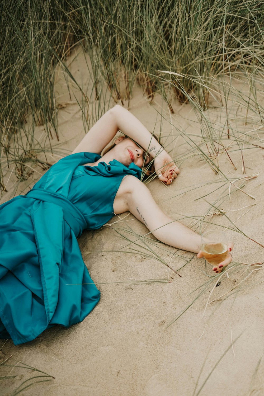 woman lying on sand