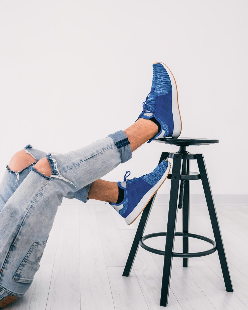 pair of blue-and-white running shoes