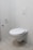 A modern 3-liter geyser mounted on a bathroom wall.
