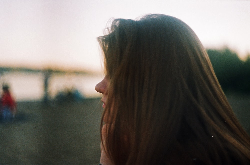 selective focus photo of woman's profile