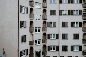 Wide shot of a residential building featuring custom aluminum doors and windows.
