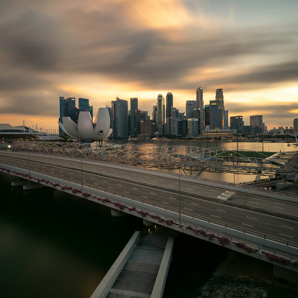 road and buildings near body of water