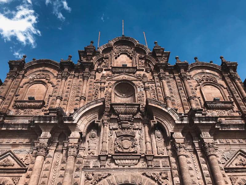 The cathedral and arcaded mansions framing Cusco's Plaza de Armas