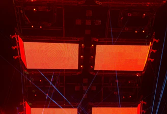 A vibrant LED screen glowing brightly in a modern office setting.