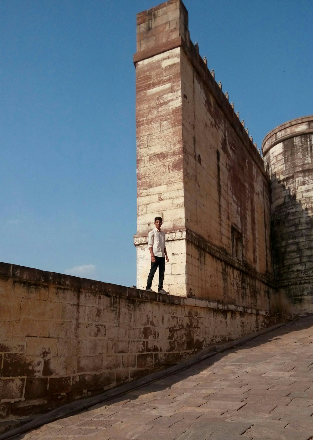 man standing near wall