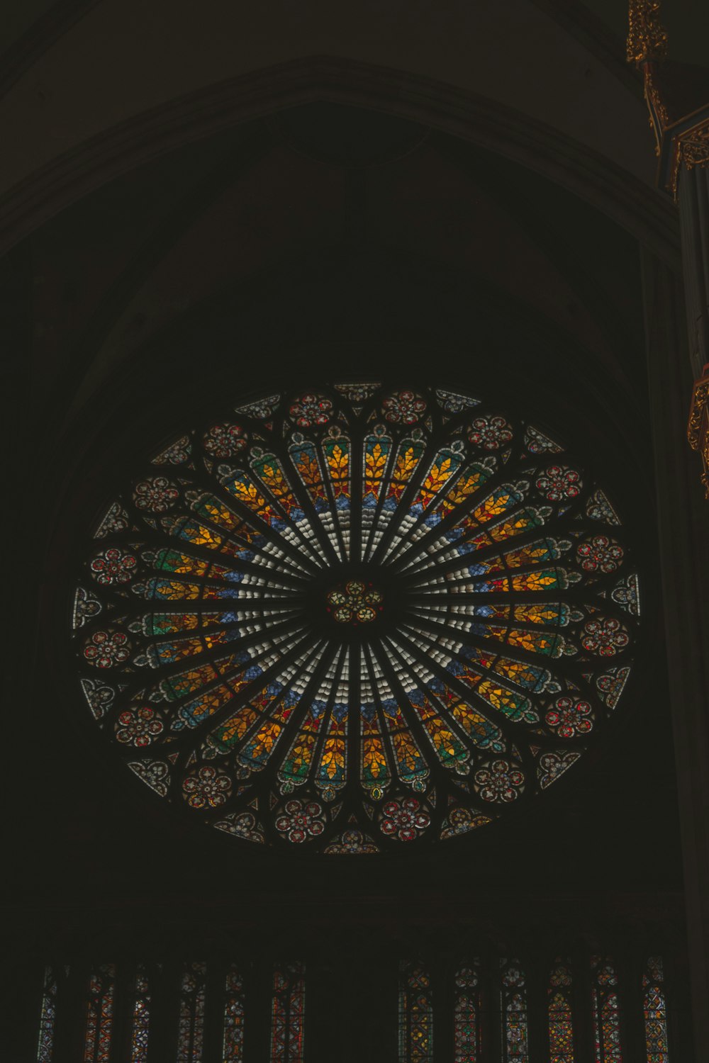 a large stained glass window inside of a building