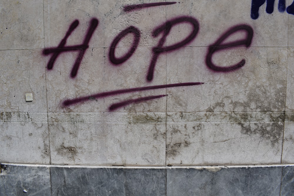 hope text on grey concrete wall