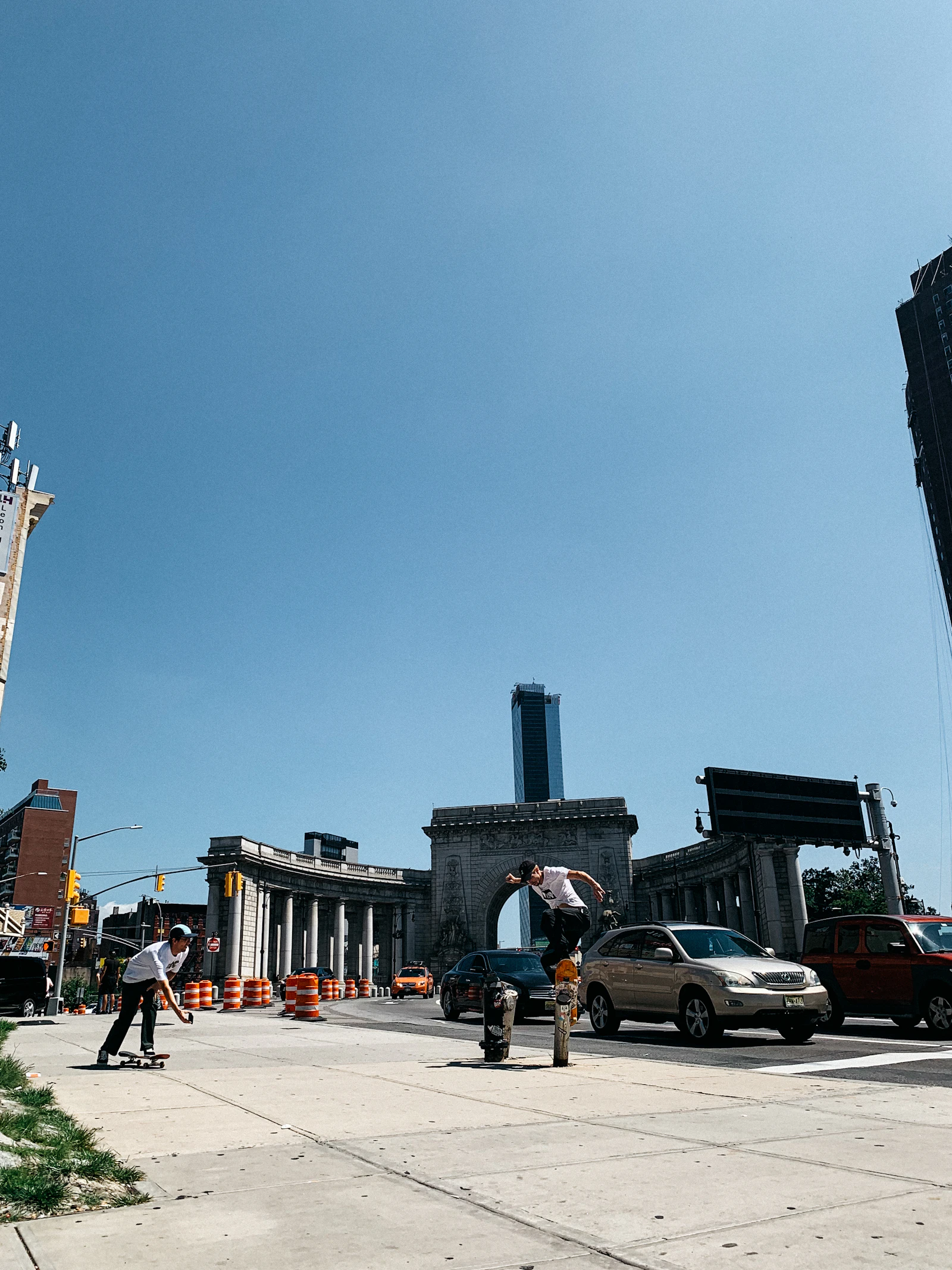 Riders posting up at a downtown clock tower